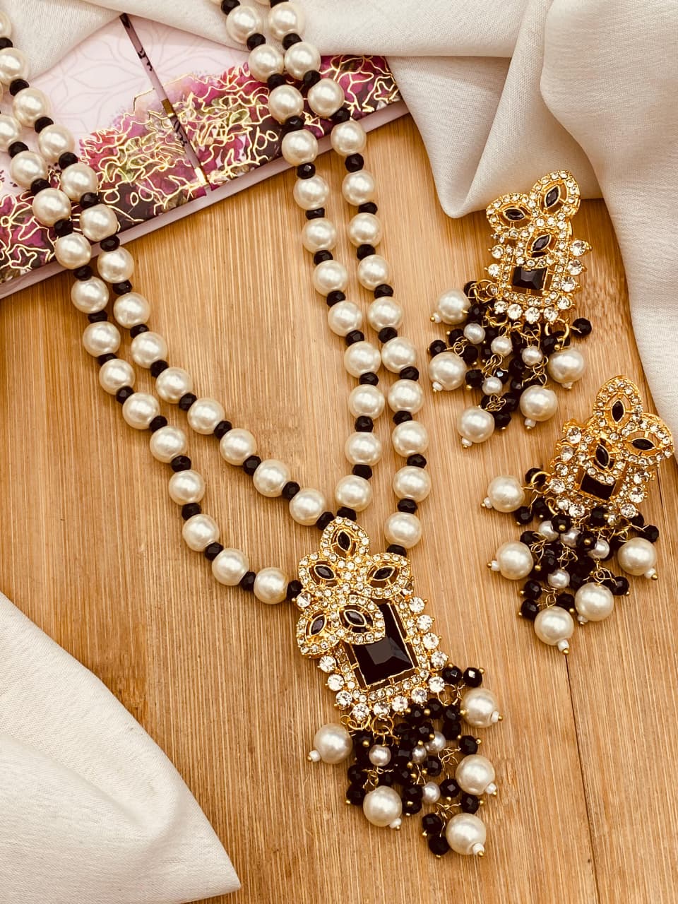 Zircon Mala Tops