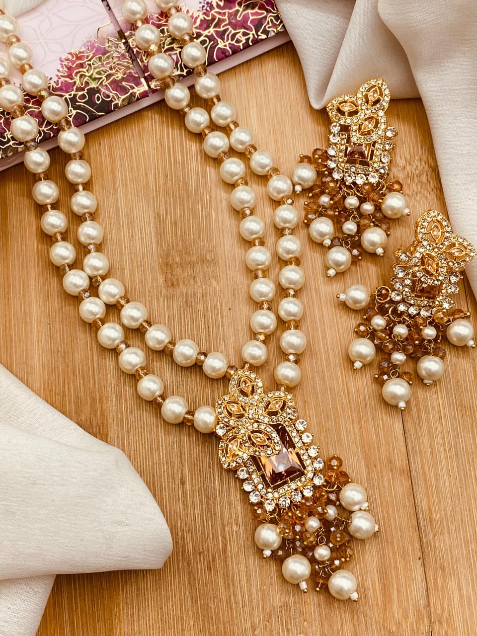 Zircon Mala Tops